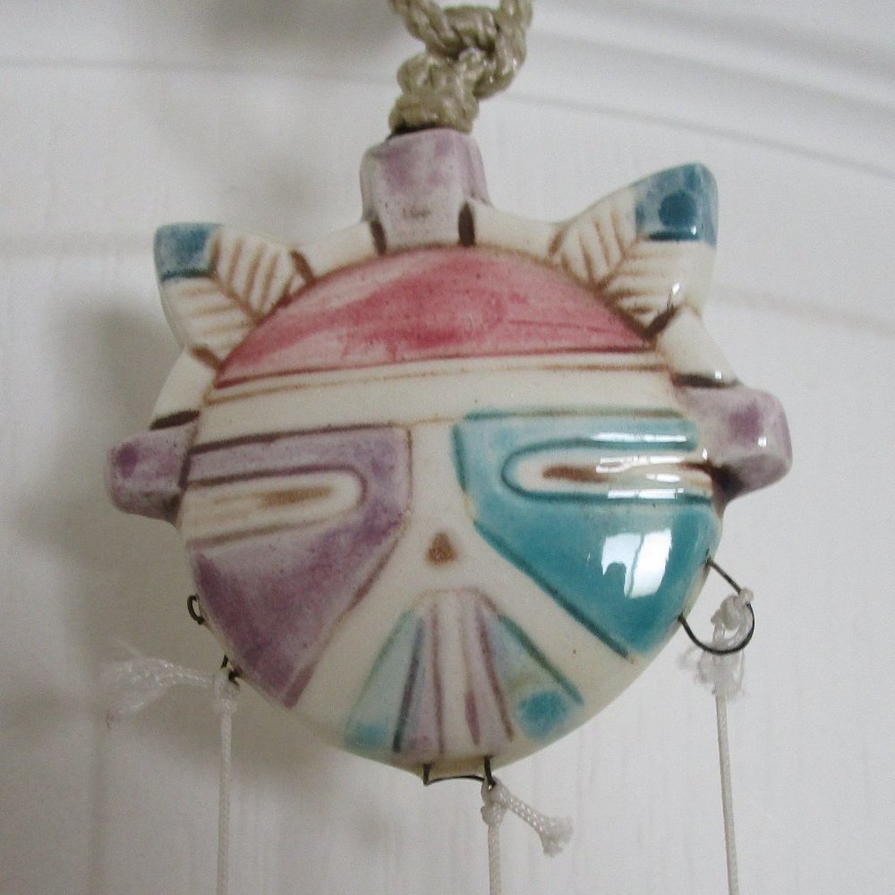 ceramic kachina face & feathers windchime